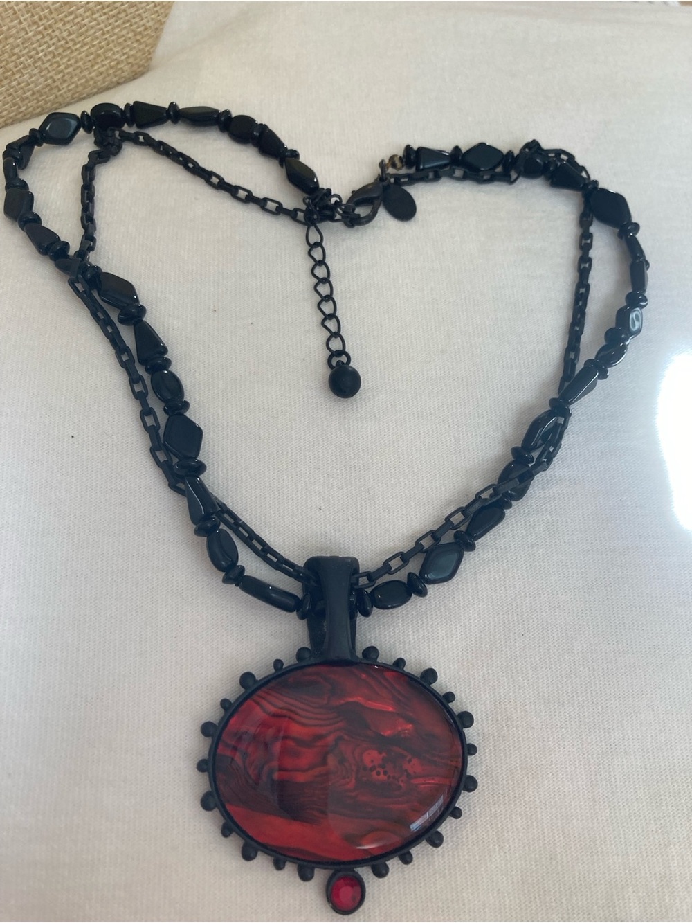 Chico’s Black Multiple Chain with Red Pendant